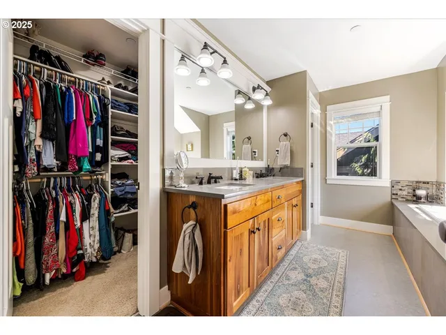 a open kitchen with wooden floor and a sink