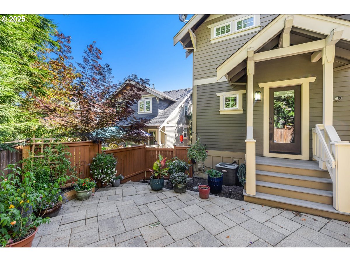 8250 Southwest Indigo Terrace Beaverton, OR 97007 - Photo 37 of 46 a view of a house with a yard