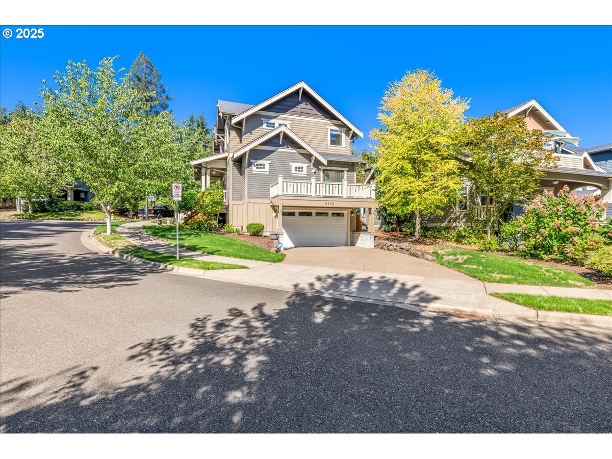 8250 Southwest Indigo Terrace Beaverton, OR 97007 - Photo 4 of 46 a front view of a house with a yard