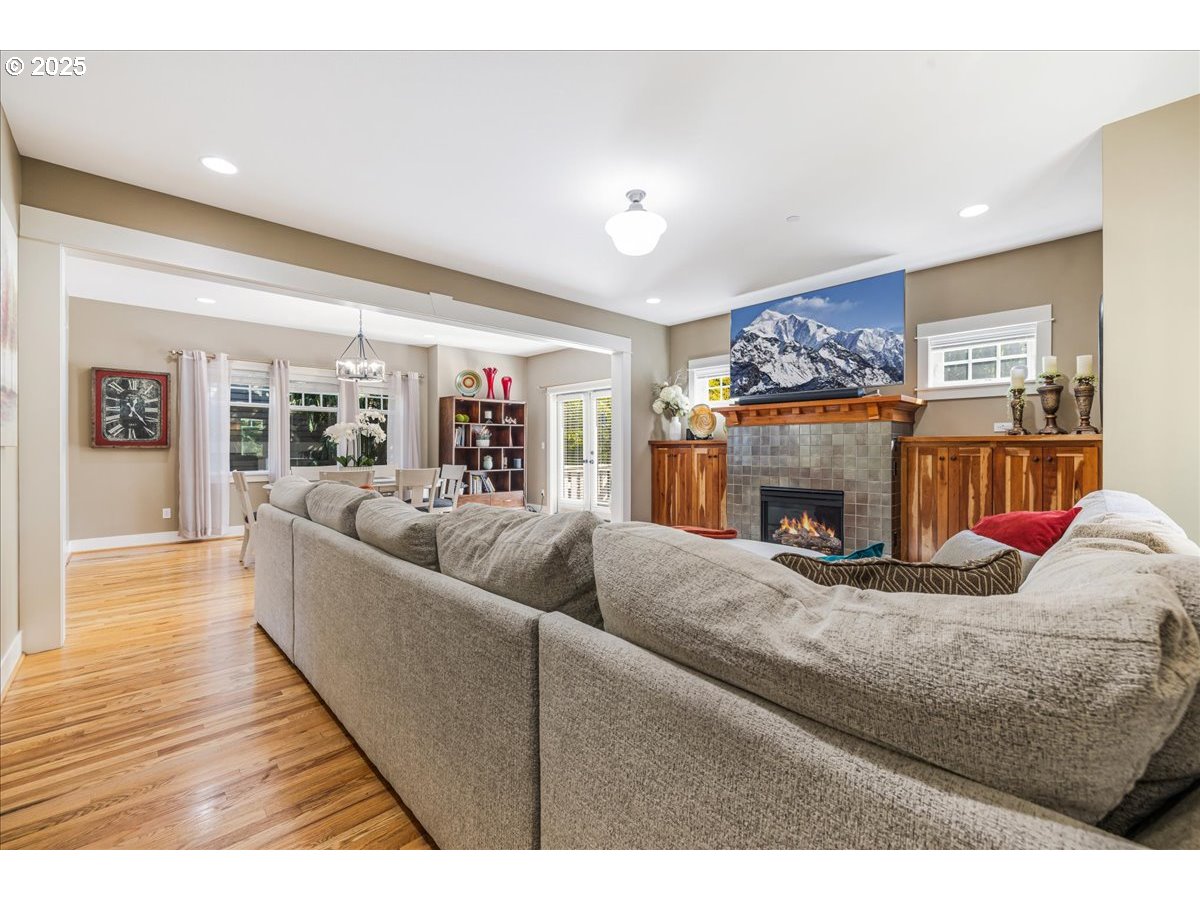 8250 Southwest Indigo Terrace Beaverton, OR 97007 - Photo 9 of 46 a living room with furniture and a fireplace