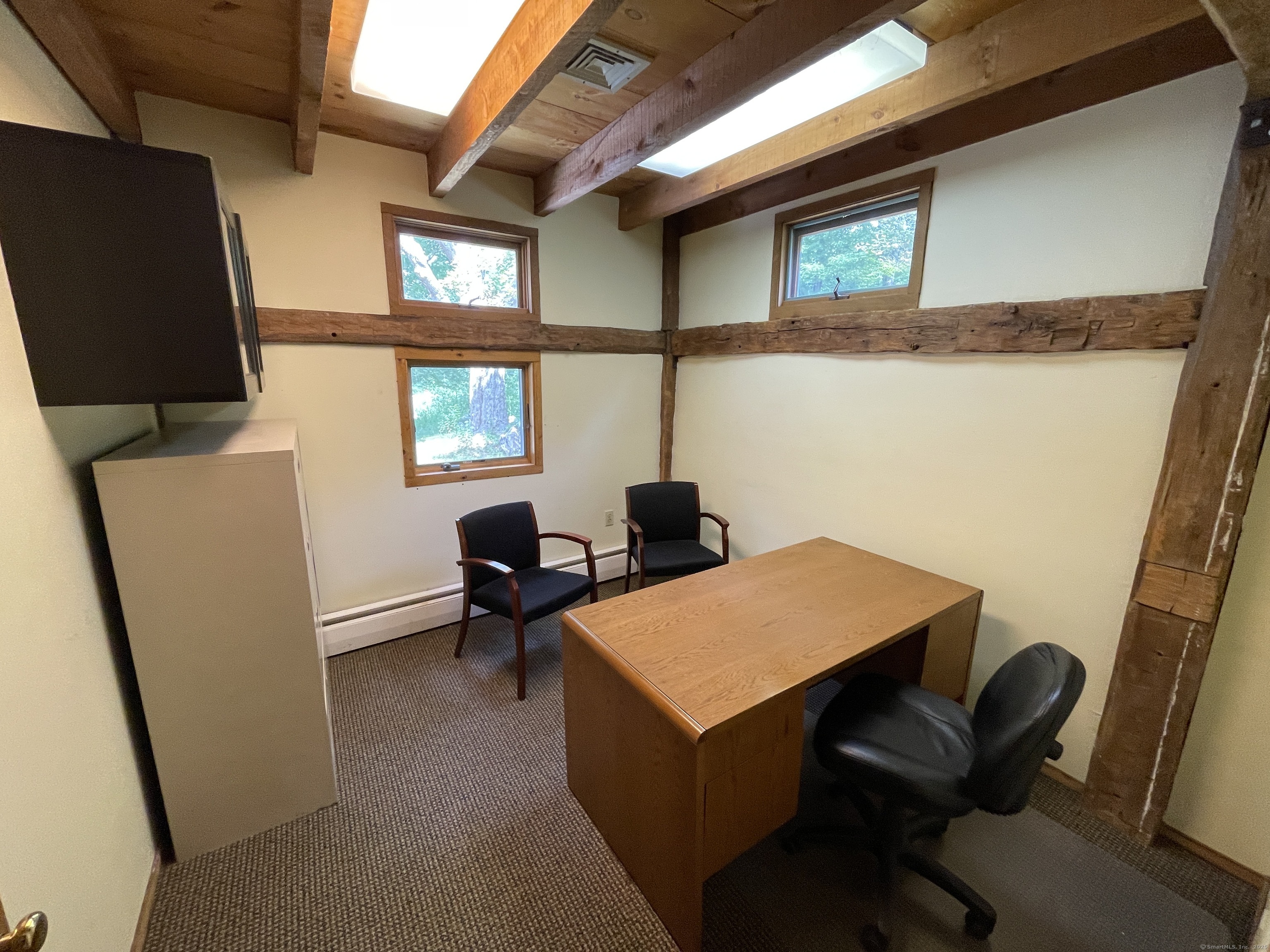 167 Baxter Road Mansfield, CT 06268 - Photo 16 of 22 a room with furniture and a window