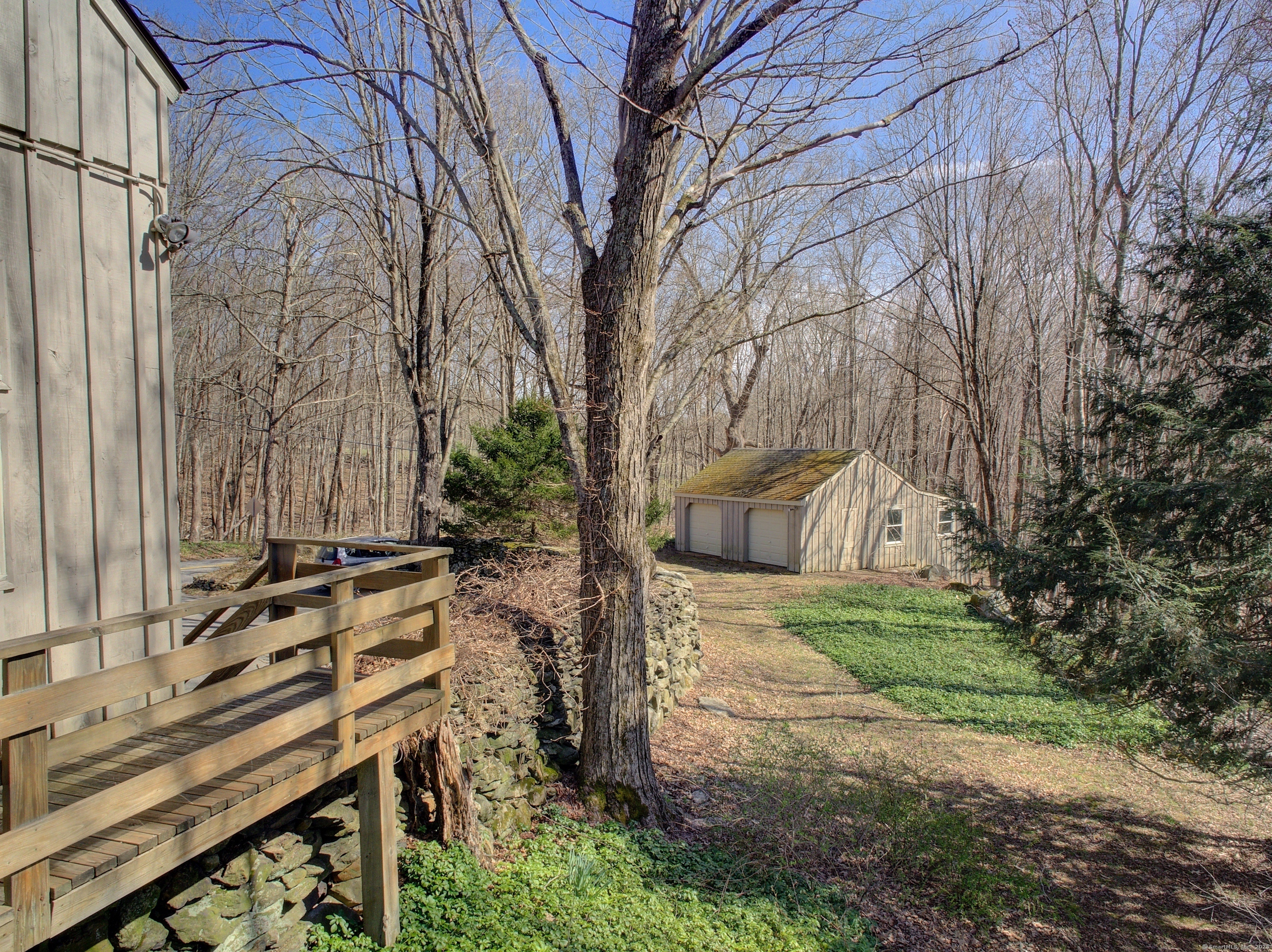 167 Baxter Road Mansfield, CT 06268 - Photo 6 of 22 a backyard of a house with lots of green space