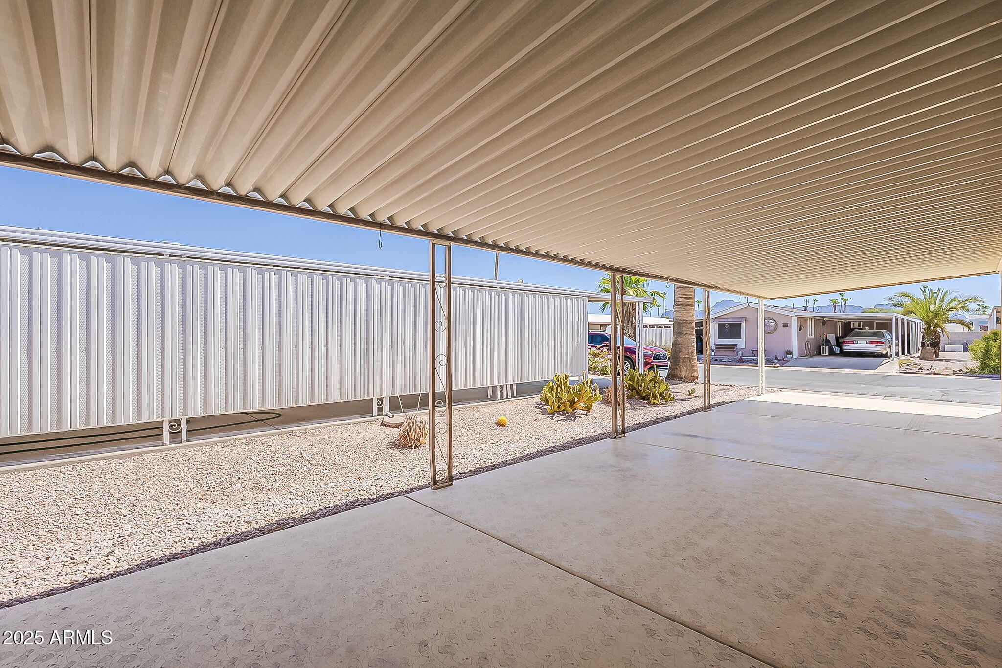 834 South Meridian Road, Unit 118 Apache Junction, AZ 85120 - Photo 41 of 50 a view of an outdoor space and a garage