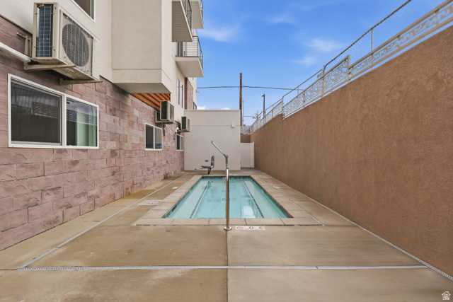 2085 North Main Street, Unit 108 Sunset, UT 84015 - Photo 17 of 19 Community heated spa with a patio