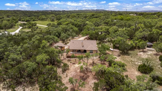 a view of a lake and a yard