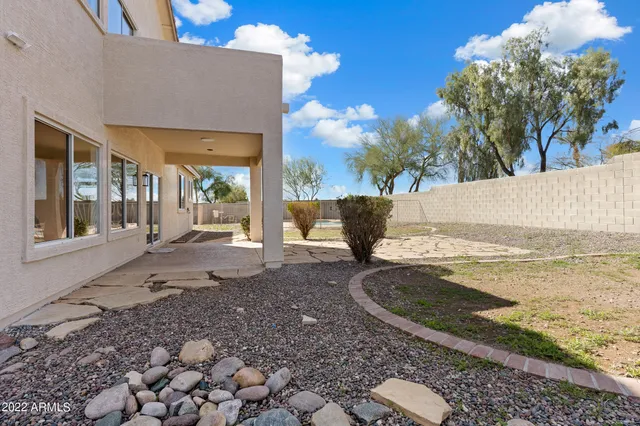 a view of a balcony with wooden floor