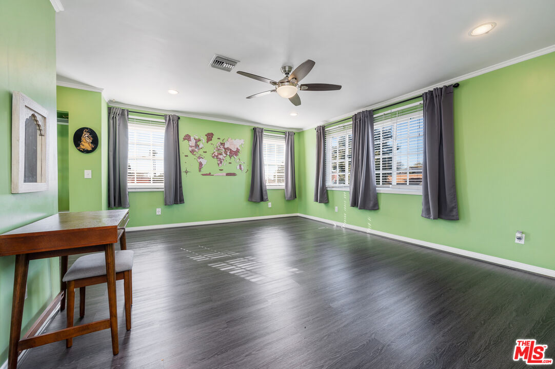318 East Fairview Boulevard Inglewood, CA 90302 - Photo 29 of 45 a view of an livingroom with furniture window and wooden floor