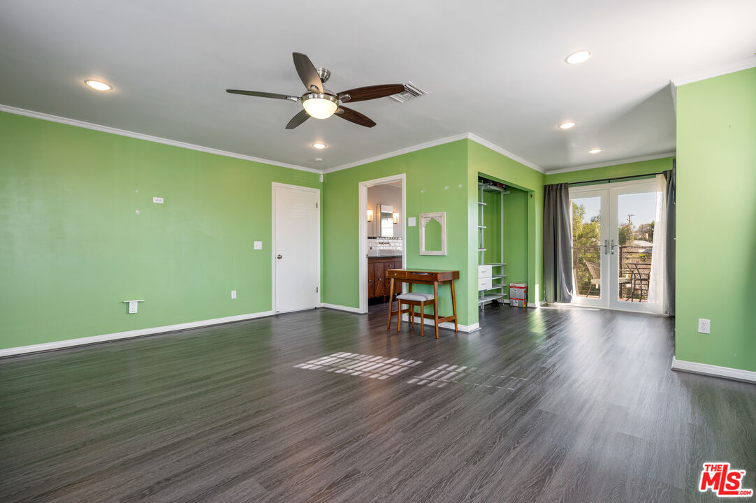 318 East Fairview Boulevard Inglewood, CA 90302 - Photo 33 of 45 a view of empty room with wooden floor and fan