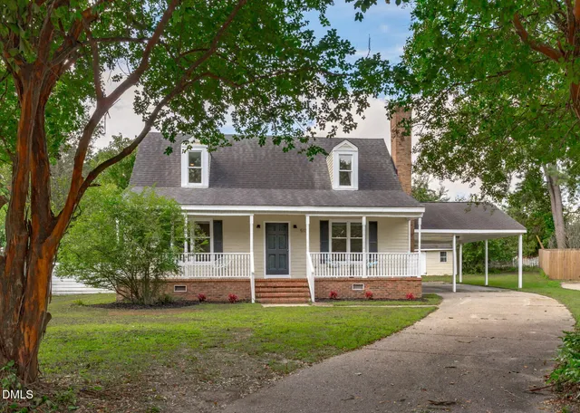 front view of a house with a yard