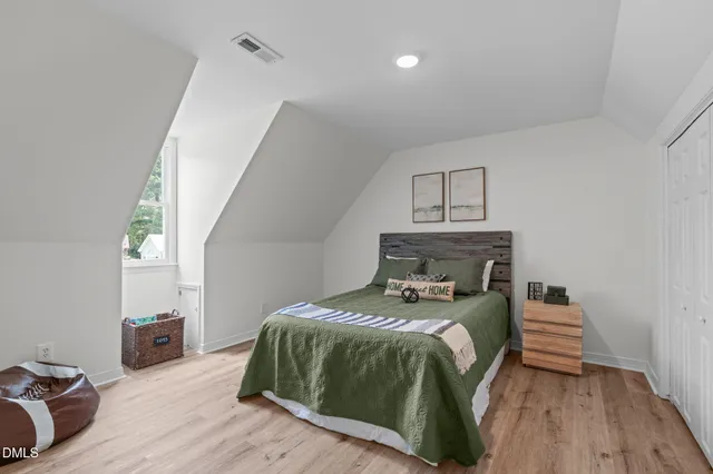 a bathroom with a sink a mirror and shower