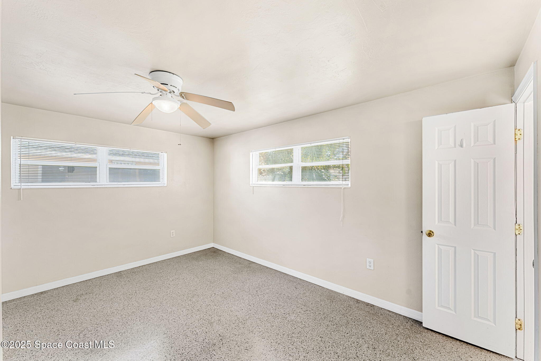 141 Diane Circle Indialantic, FL 32903 - Photo 19 of 36 a view of an empty room with a window