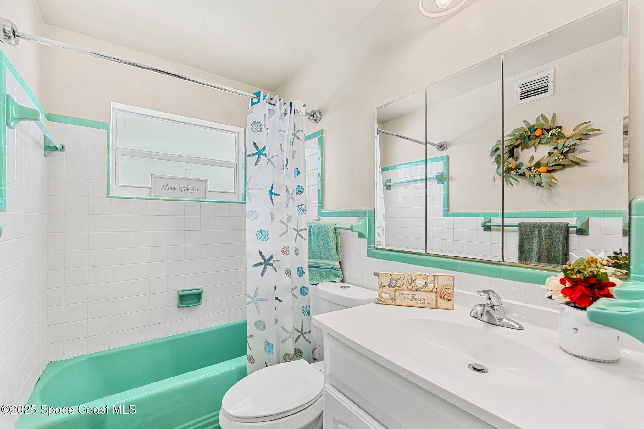 141 Diane Circle Indialantic, FL 32903 - Photo 20 of 36 a bathroom with a sink toilet and shower