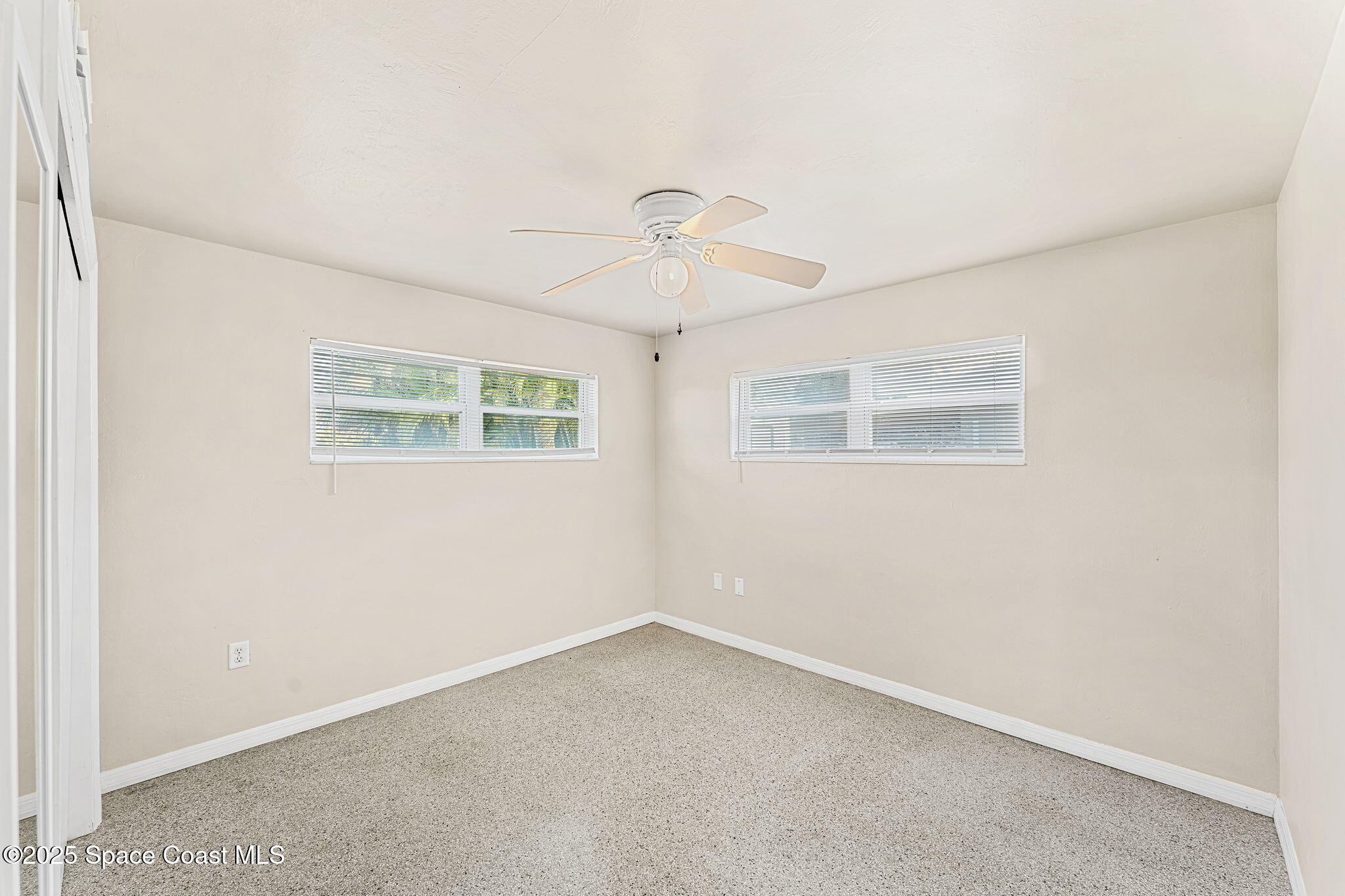 141 Diane Circle Indialantic, FL 32903 - Photo 21 of 36 an empty room with a window
