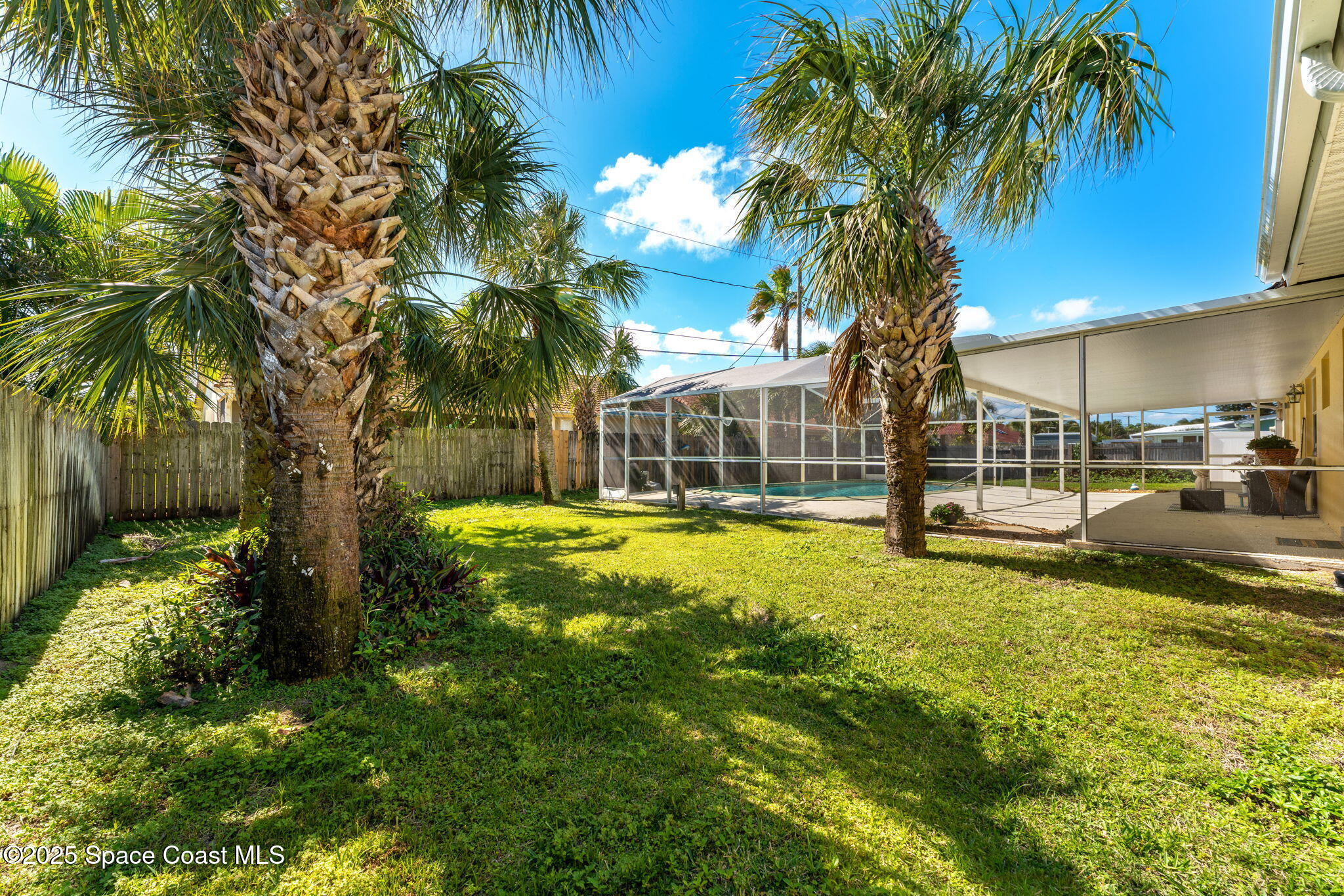 141 Diane Circle Indialantic, FL 32903 - Photo 26 of 36 a view of a house with swimming pool