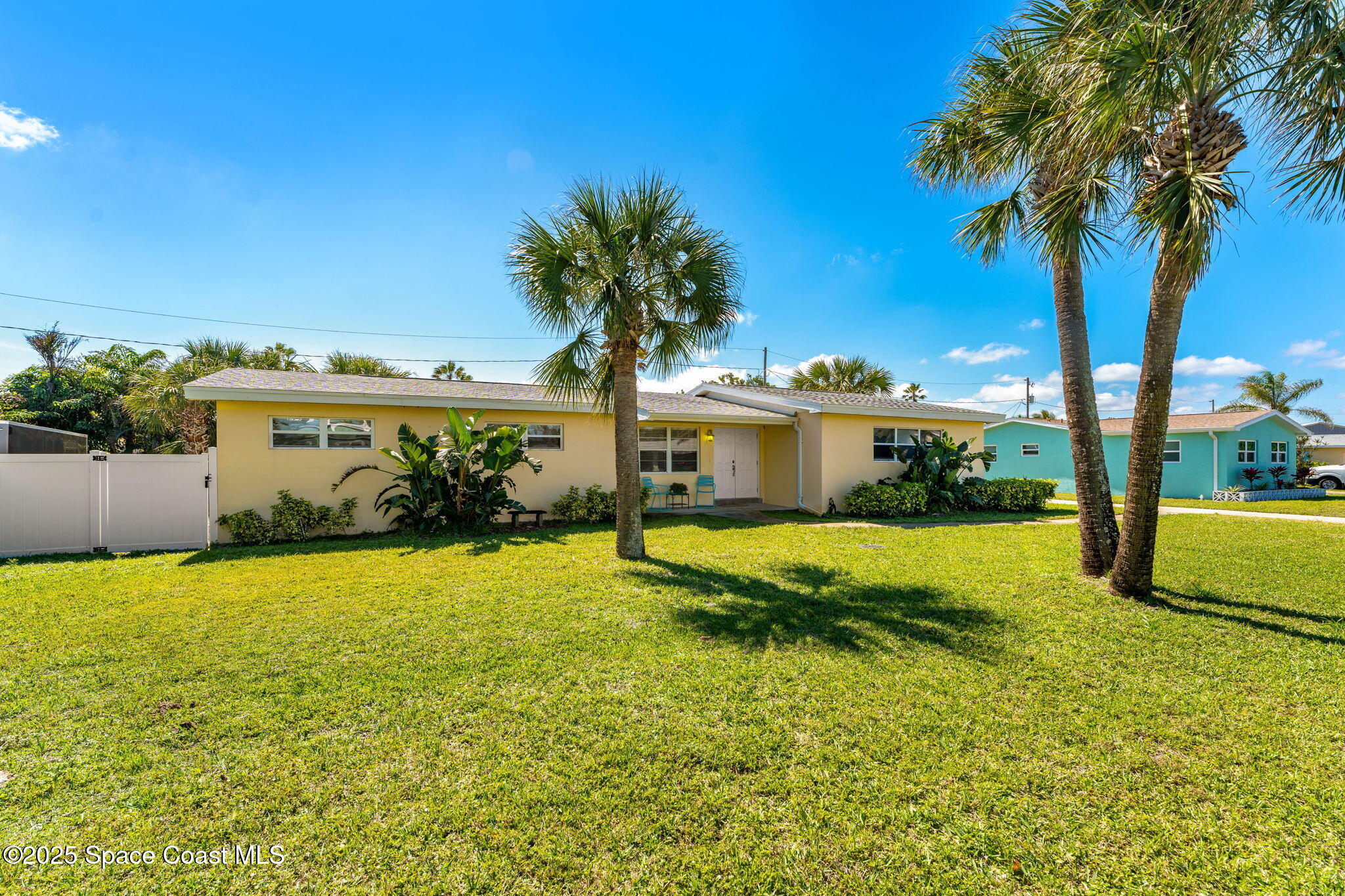 141 Diane Circle Indialantic, FL 32903 - Photo 28 of 36 a view of a house with swimming pool and a yard