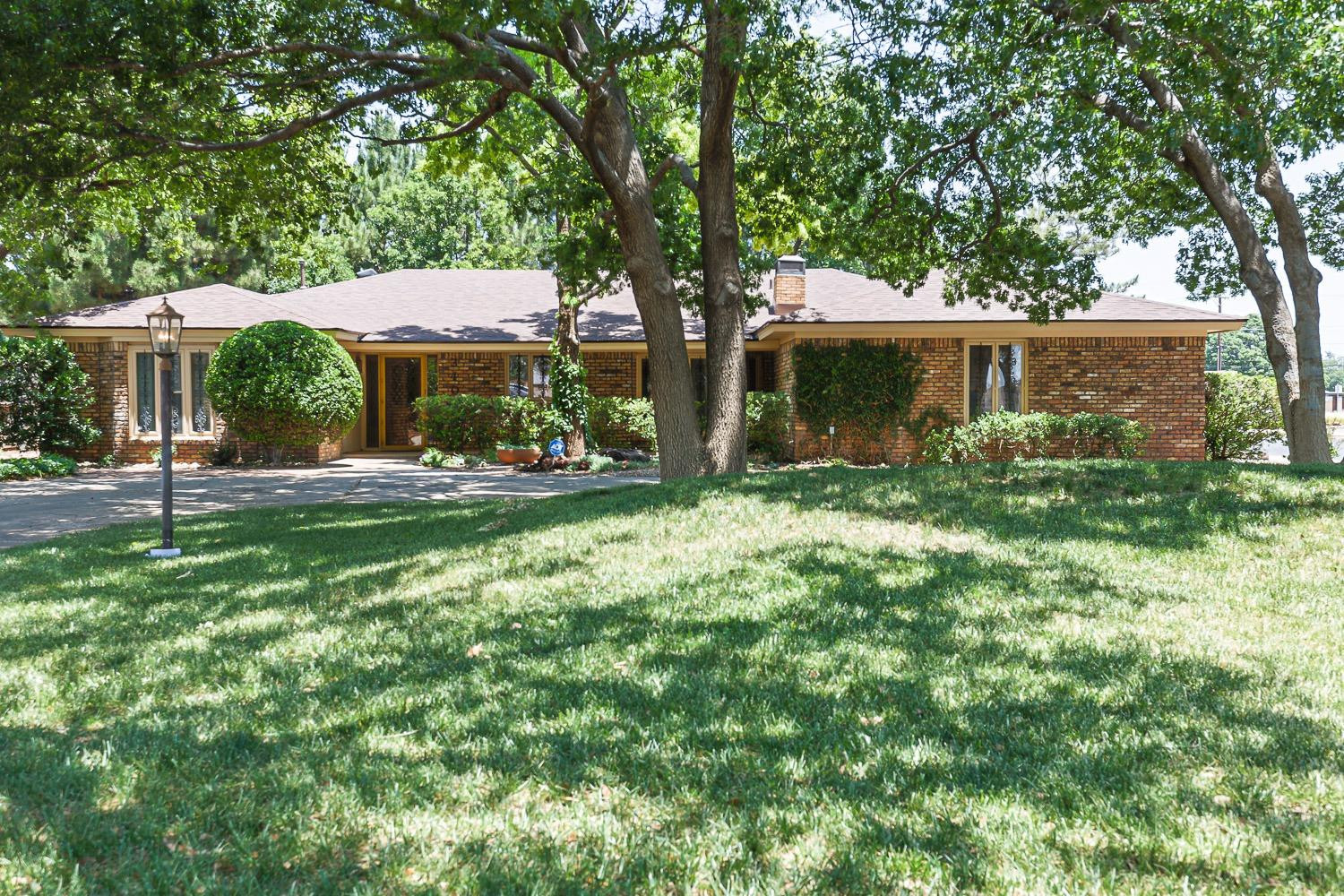 3402 79th Street Lubbock, TX 79423 - Photo 1 of 49 a view of a house with a yard