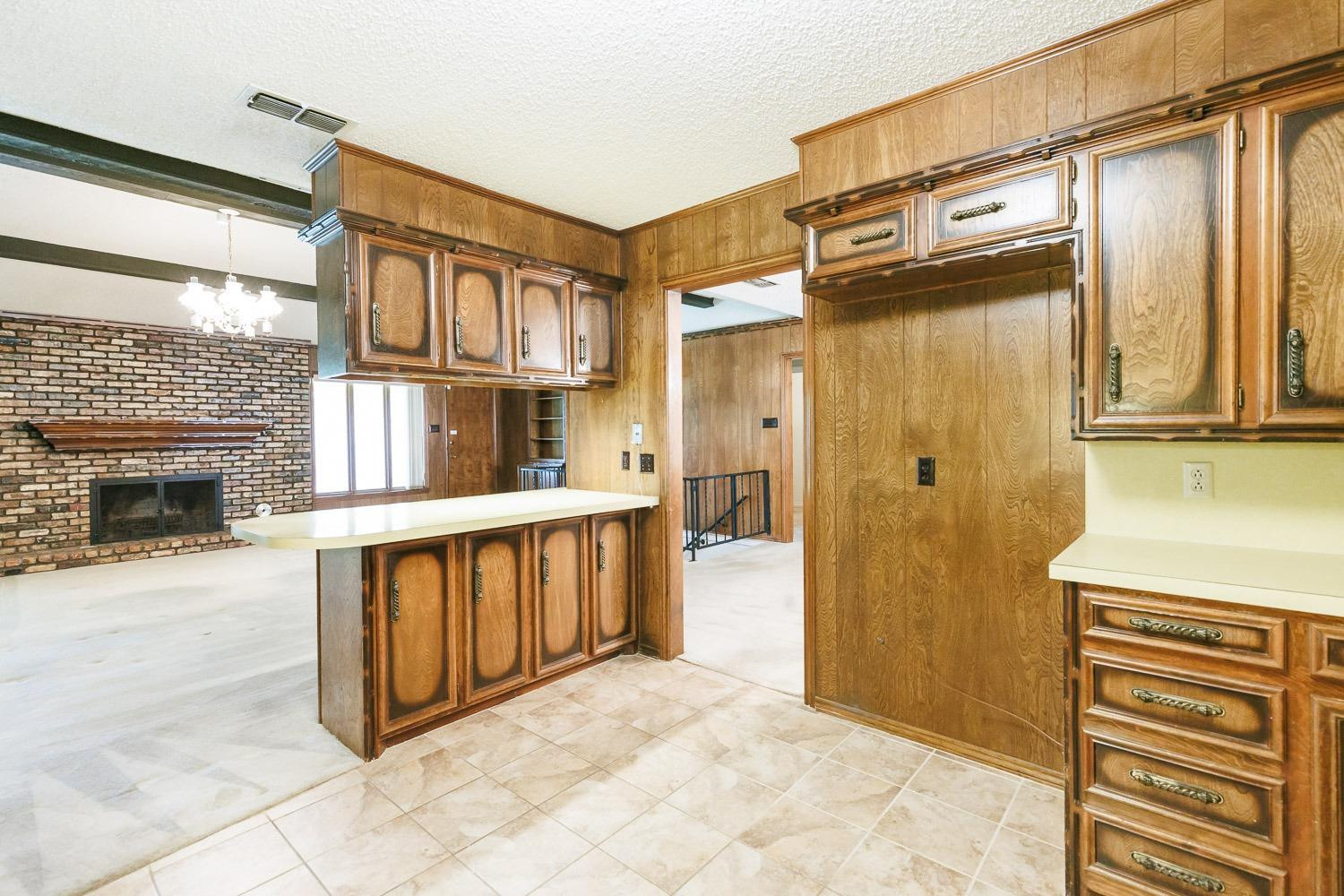 3402 79th Street Lubbock, TX 79423 - Photo 14 of 49 a view of a back door of the house