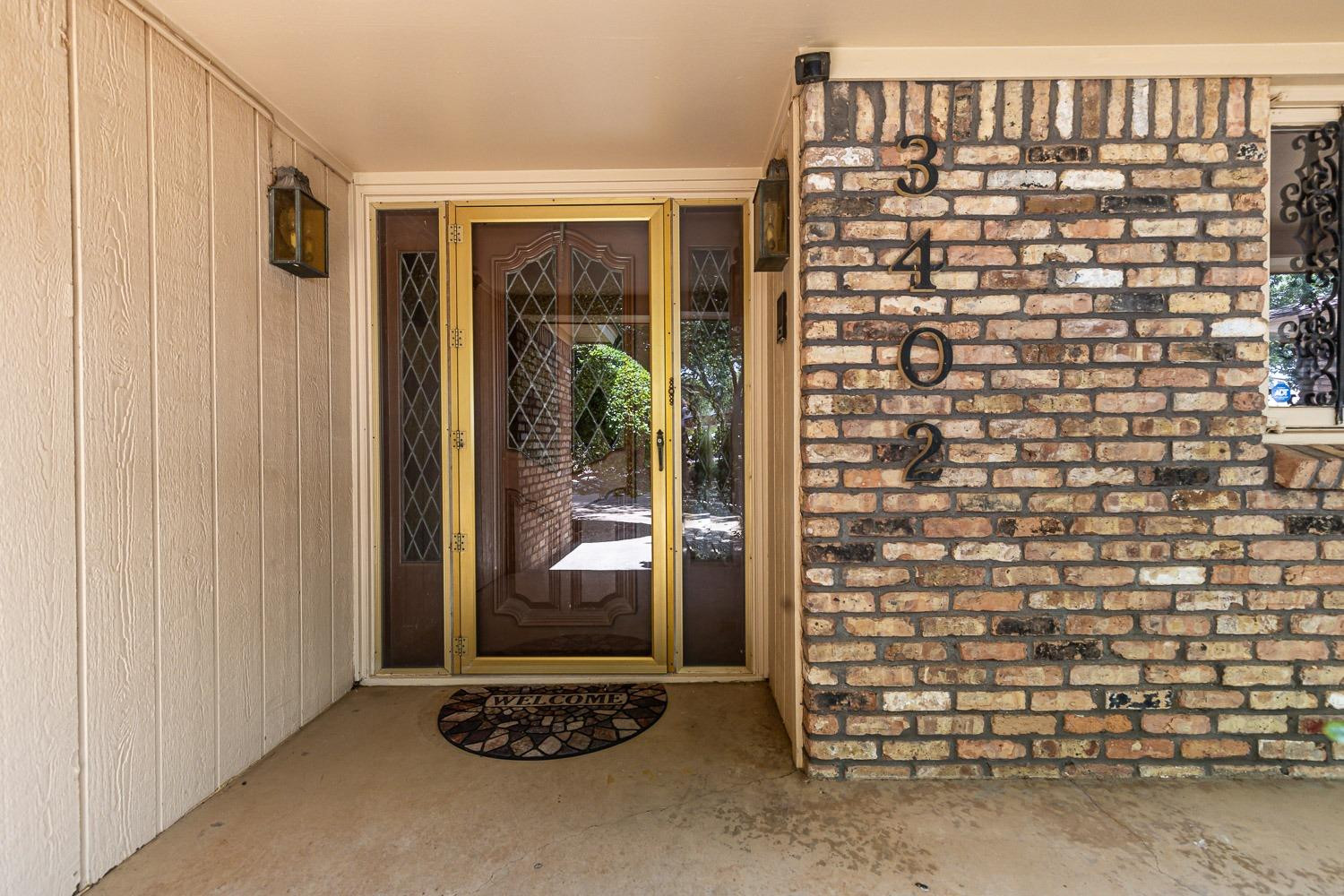 3402 79th Street Lubbock, TX 79423 - Photo 3 of 49 a view of front door