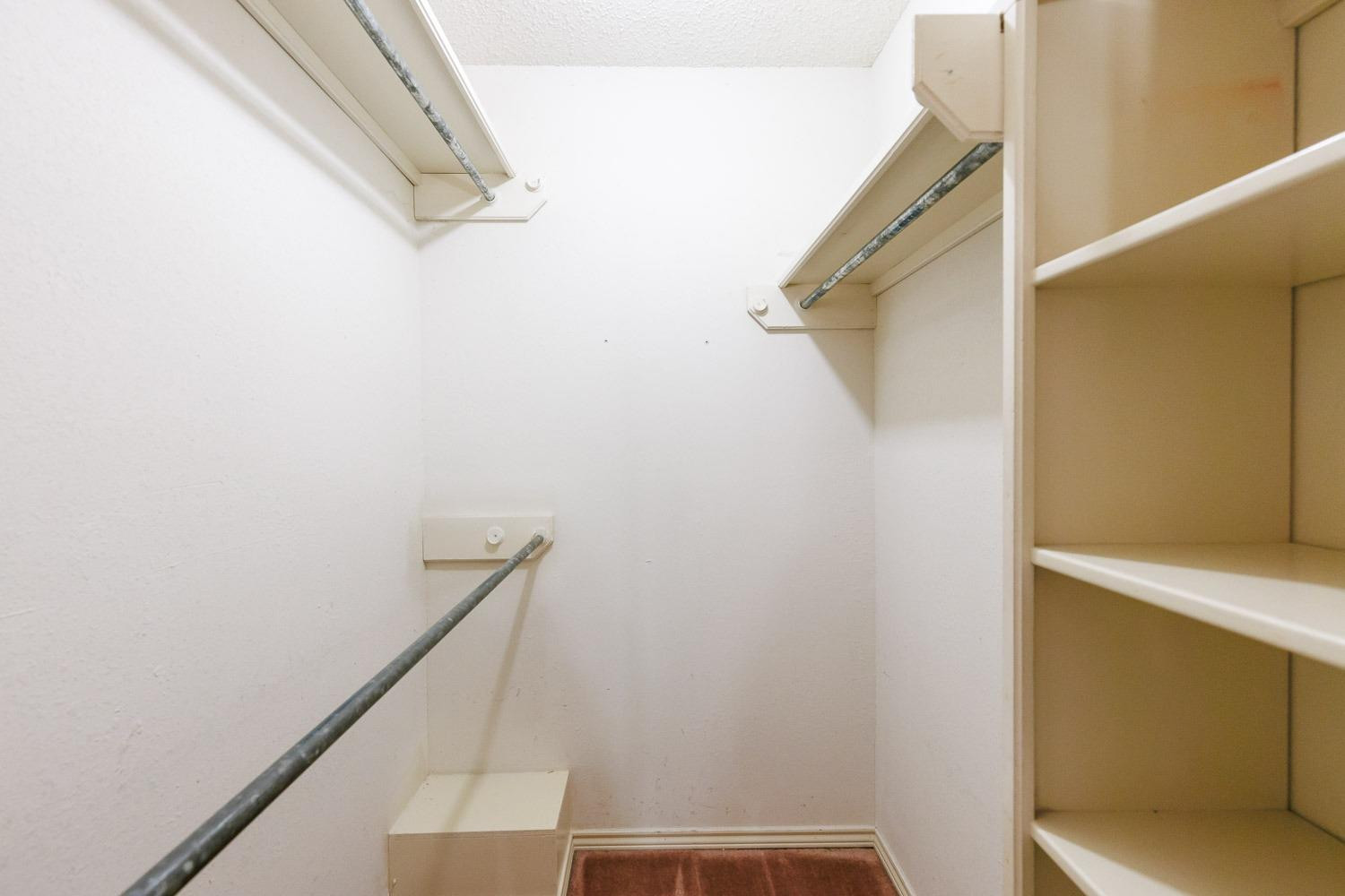 3402 79th Street Lubbock, TX 79423 - Photo 34 of 49 a view of walk in closet