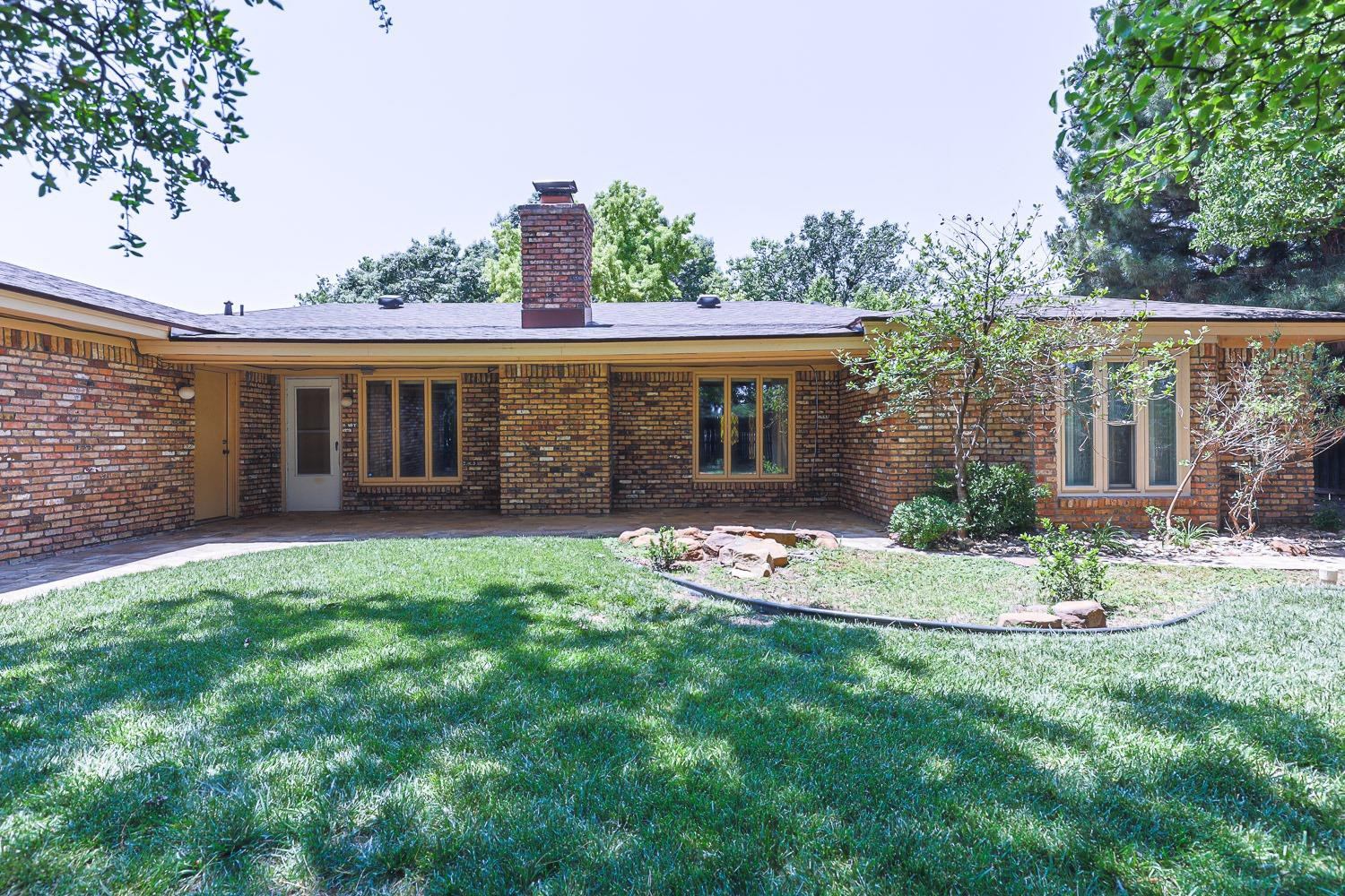 3402 79th Street Lubbock, TX 79423 - Photo 48 of 49 a view of a house with backyard and porch