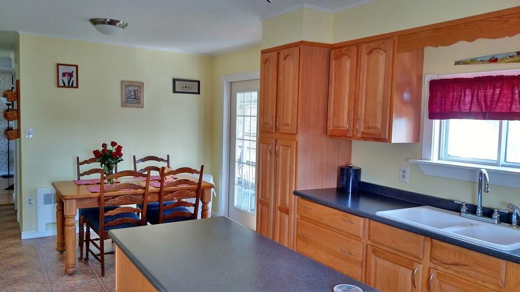 305 Main Road Eddington, ME 04428 - Photo 2 of 35 Bright and cheery eat-in kitchen