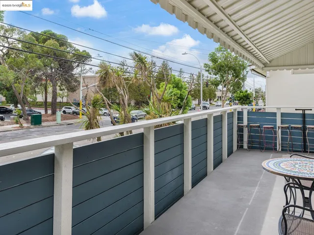 a view of a chairs and table in patio