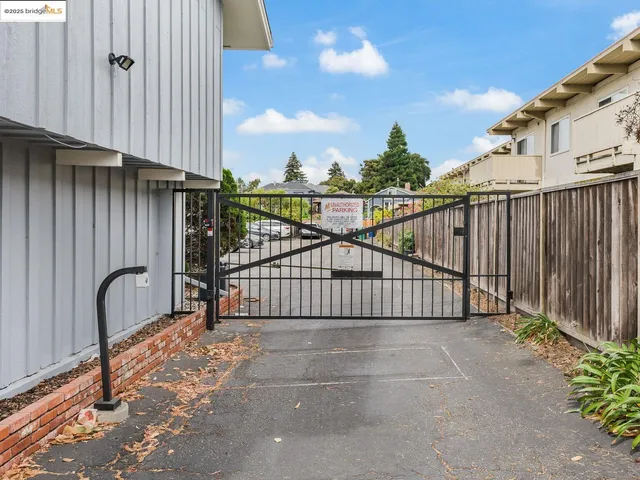 a view of a balcony with a pot