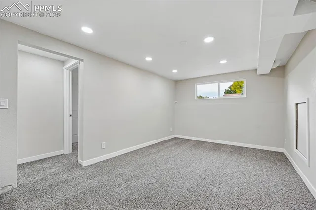 a room with furniture and gym equipment