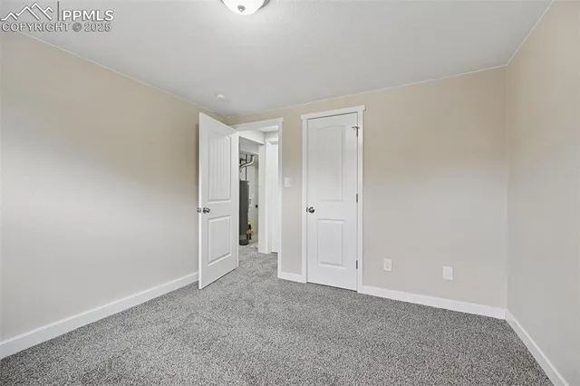 a view of a hallway with closet