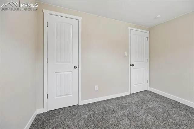 a view of garage and yard