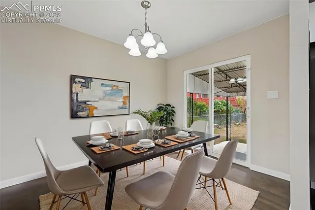 a kitchen with a refrigerator a sink and cabinets