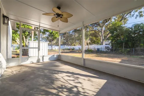 a view of an empty room with a balcony