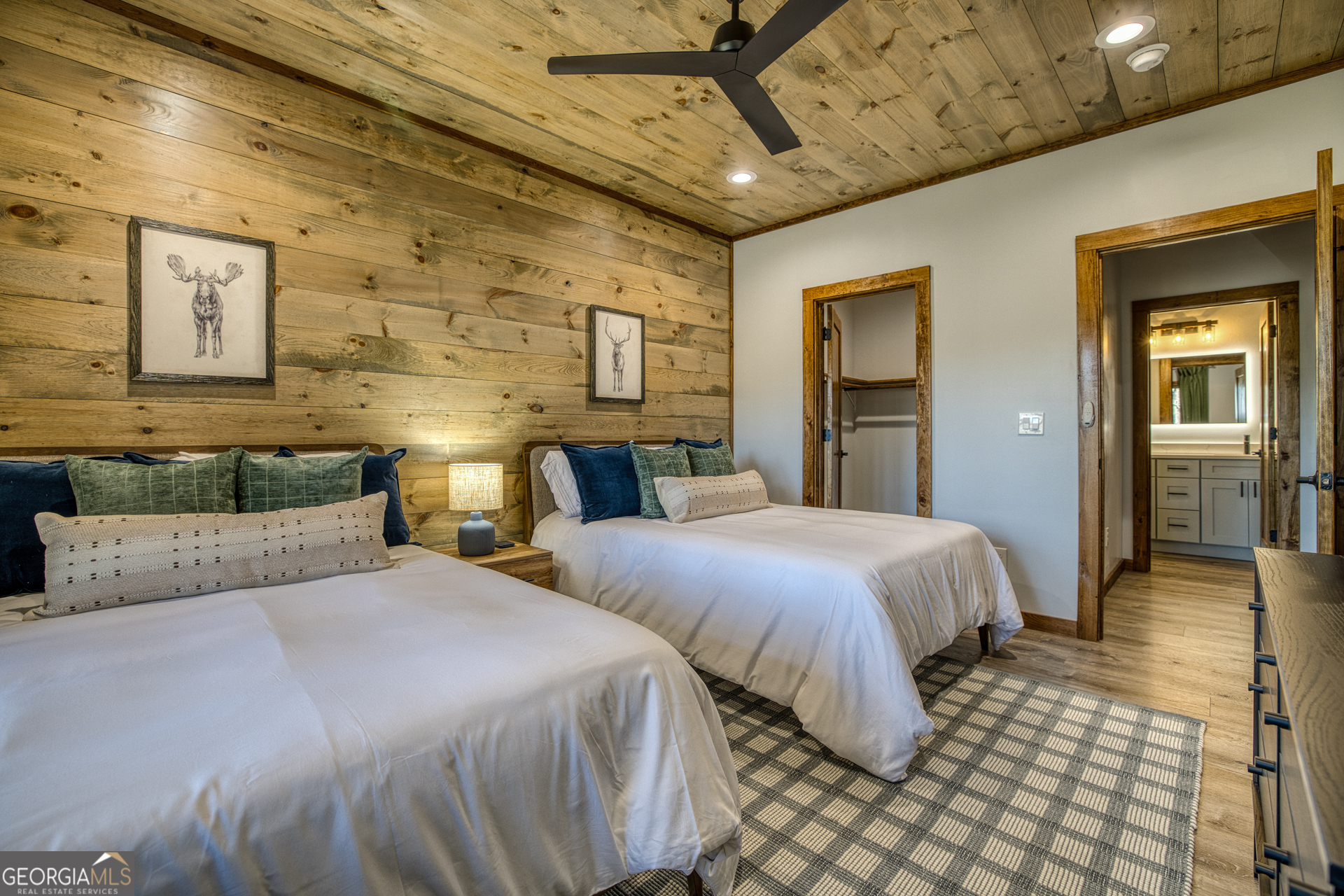 1160 Mangum's Trail Blue Ridge, GA 30513 - Photo 52 of 75 a bedroom with two beds and painting on the wall