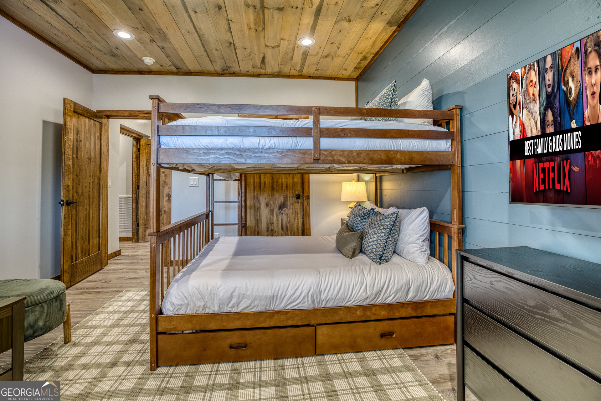 1160 Mangum's Trail Blue Ridge, GA 30513 - Photo 56 of 75 a bedroom with a bed and wooden floor