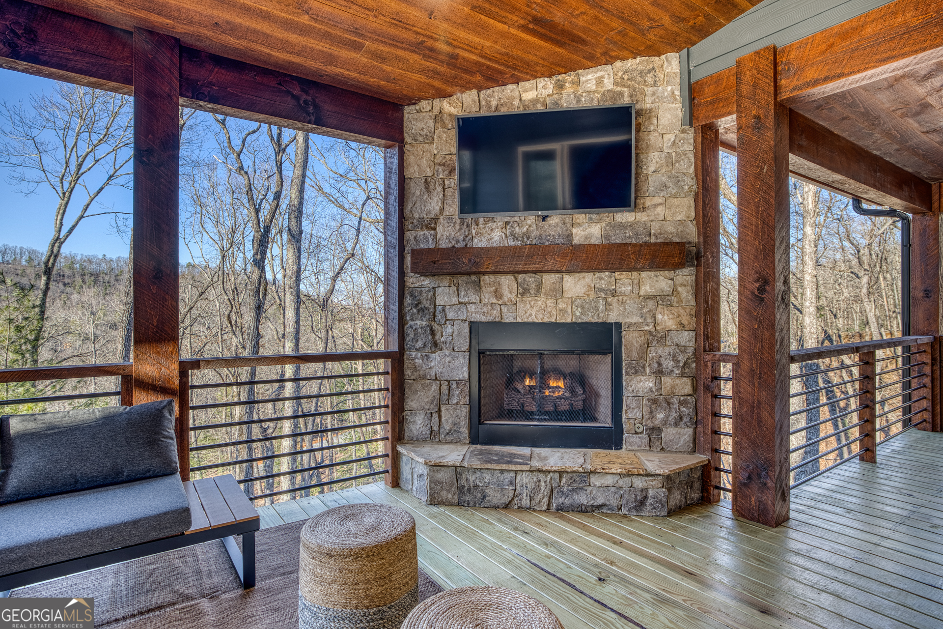 1160 Mangum's Trail Blue Ridge, GA 30513 - Photo 64 of 75 a living room with furniture and a fireplace