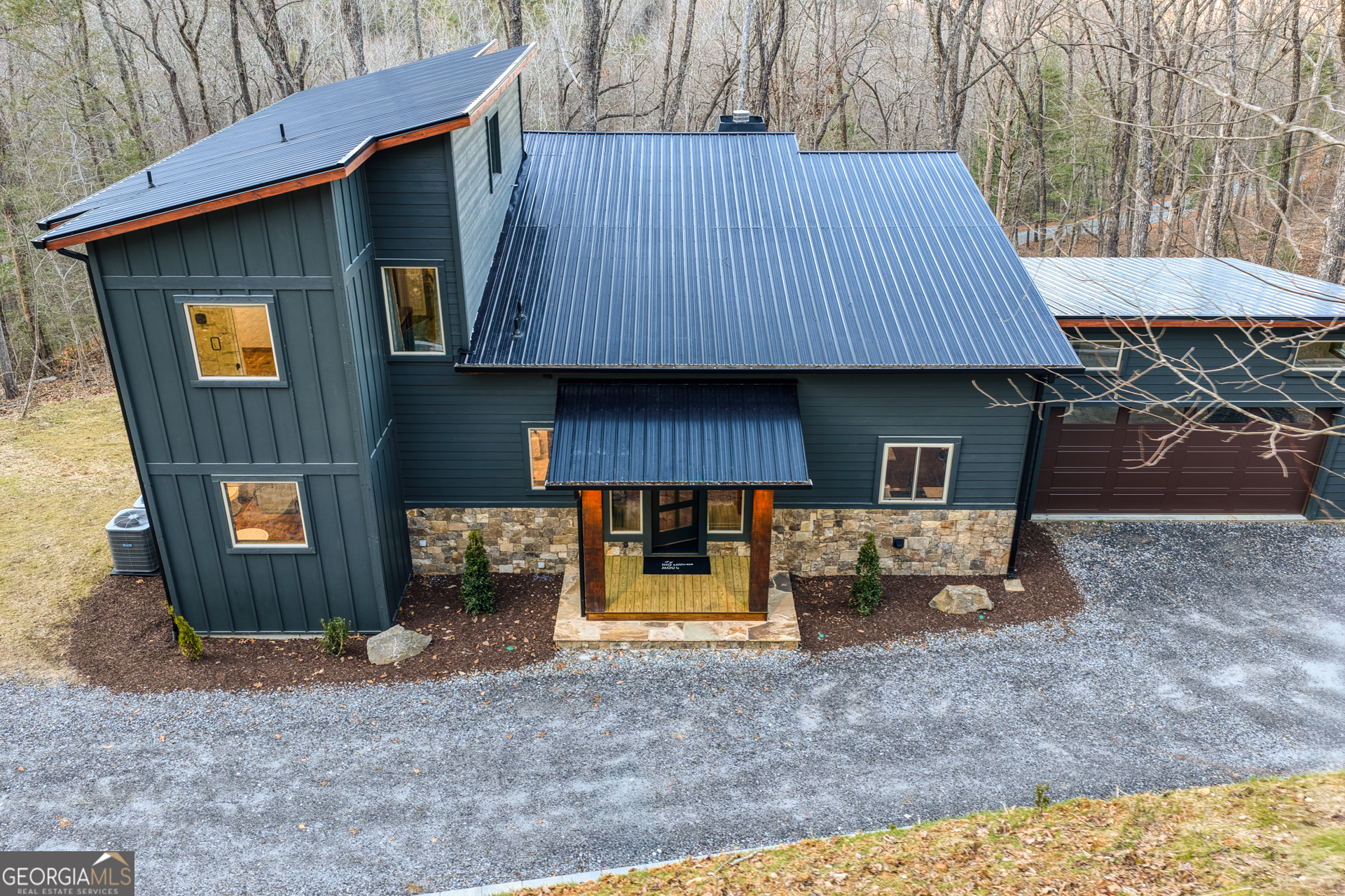 1160 Mangum's Trail Blue Ridge, GA 30513 - Photo 70 of 75 a front view of a house with garden