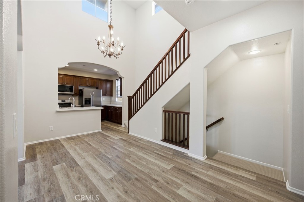 3603 Jetty Carlsbad, CA 92010 - Photo 9 of 43 a view of entryway and hall with wooden floor