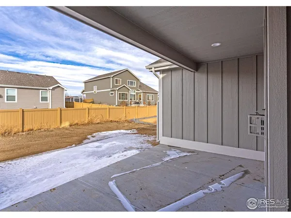 a view of a backyard of a house