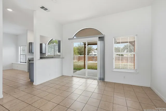 a view of a kitchen cabinets and window