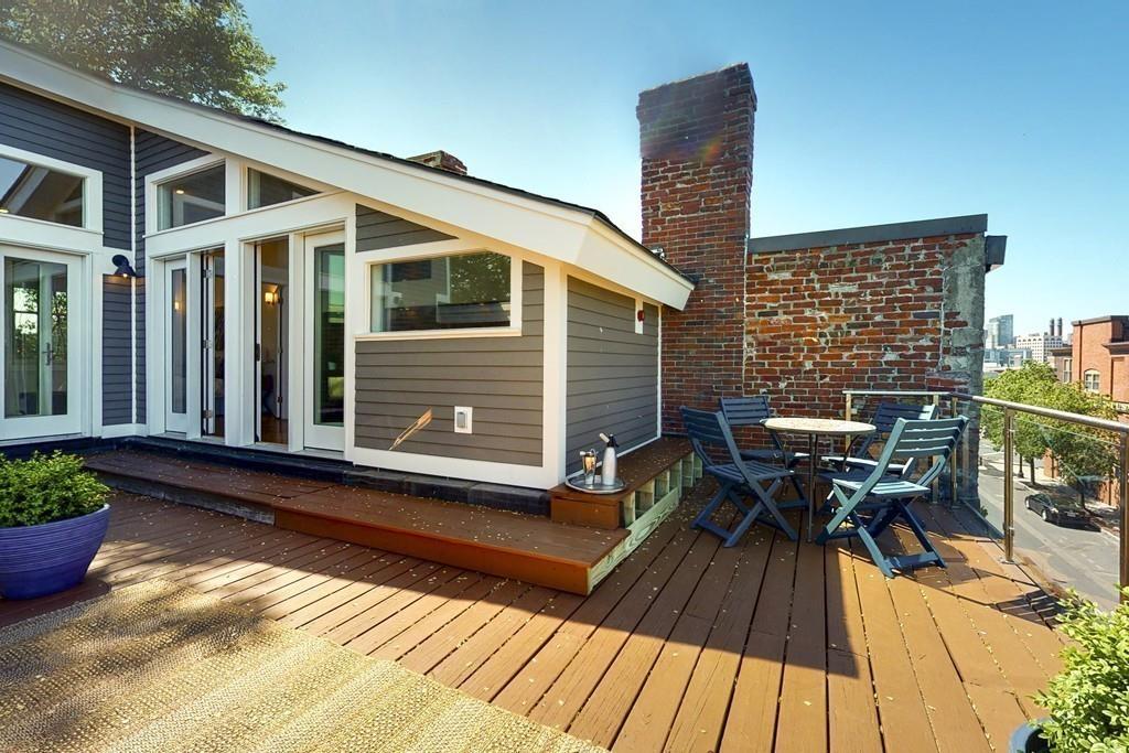 169-171 West 2nd Street Boston, MA 02127 - Photo 16 of 20 a balcony view with a seating space