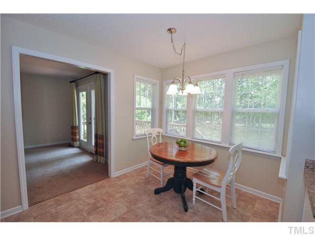 223 Ridge Drive Garner, NC 27529 - Photo 9 of 20 Lovely breakfast nook off the kitchen with a wall of windows overlooking the wonderful backyard Breakfast Area