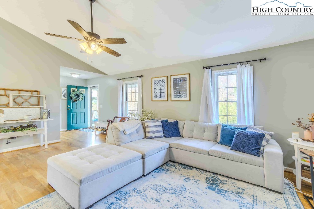 169 Violet Lane Boone, NC 28607 - Photo 12 of 27 a living room with furniture and a large window