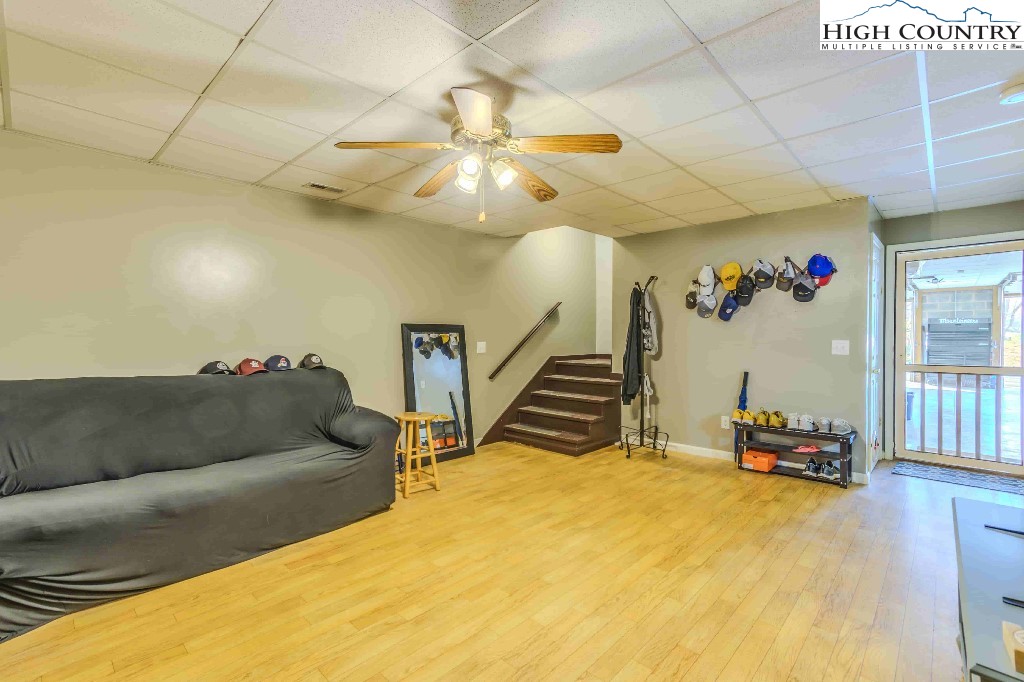 169 Violet Lane Boone, NC 28607 - Photo 21 of 27 a living room with furniture and a flat screen tv