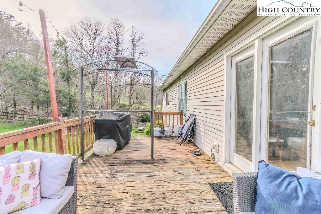 169 Violet Lane Boone, NC 28607 - Photo 24 of 27 a view of a balcony with furniture