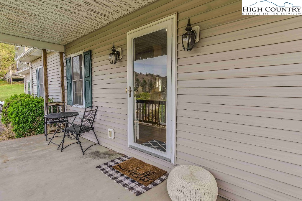 169 Violet Lane Boone, NC 28607 - Photo 26 of 27 a view of two chairs in the balcony
