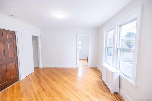 a view of an empty room and window