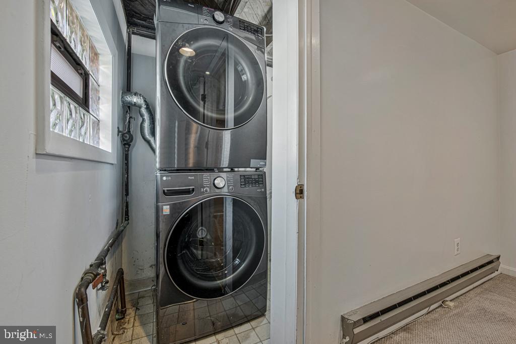 2406 37th Street Northwest Washington, DC 20007 - Photo 13 of 44 a close up view of a washer and dryer
