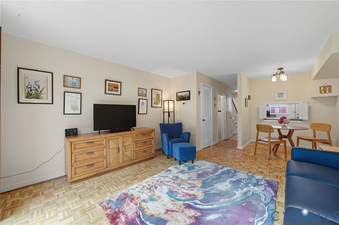 403 North Hamilton Street, Unit J Richmond, VA 23221 - Photo 5 of 27 a living room with furniture and a flat screen tv
