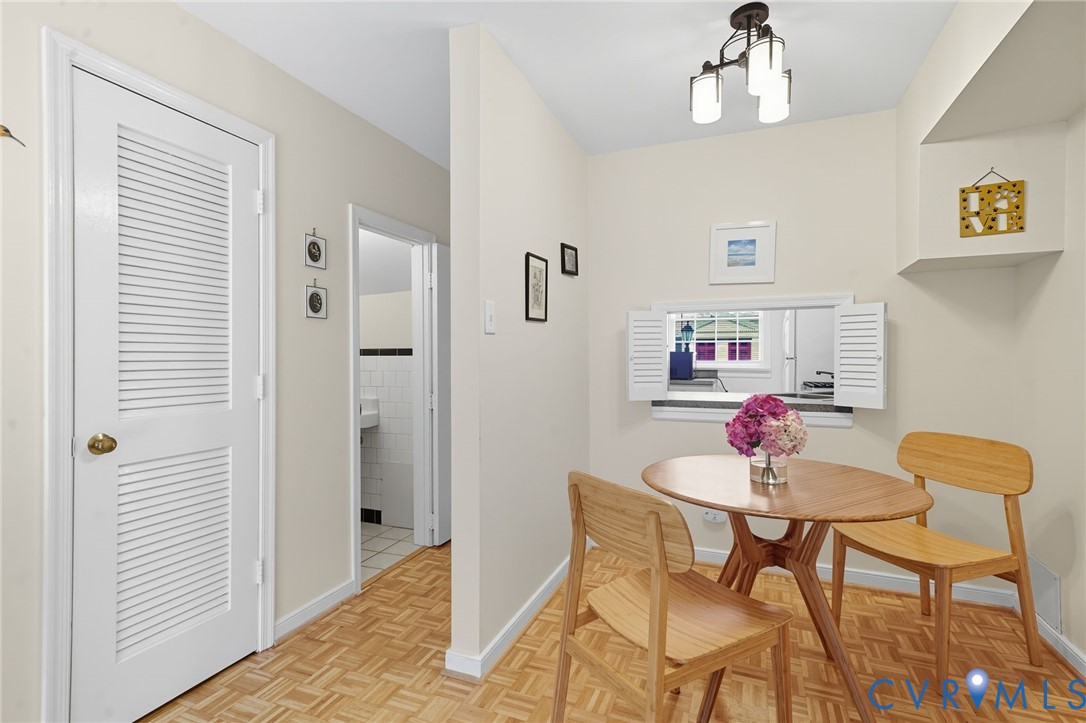 403 North Hamilton Street, Unit J Richmond, VA 23221 - Photo 6 of 27 a view of a dining room with furniture and wooden floor