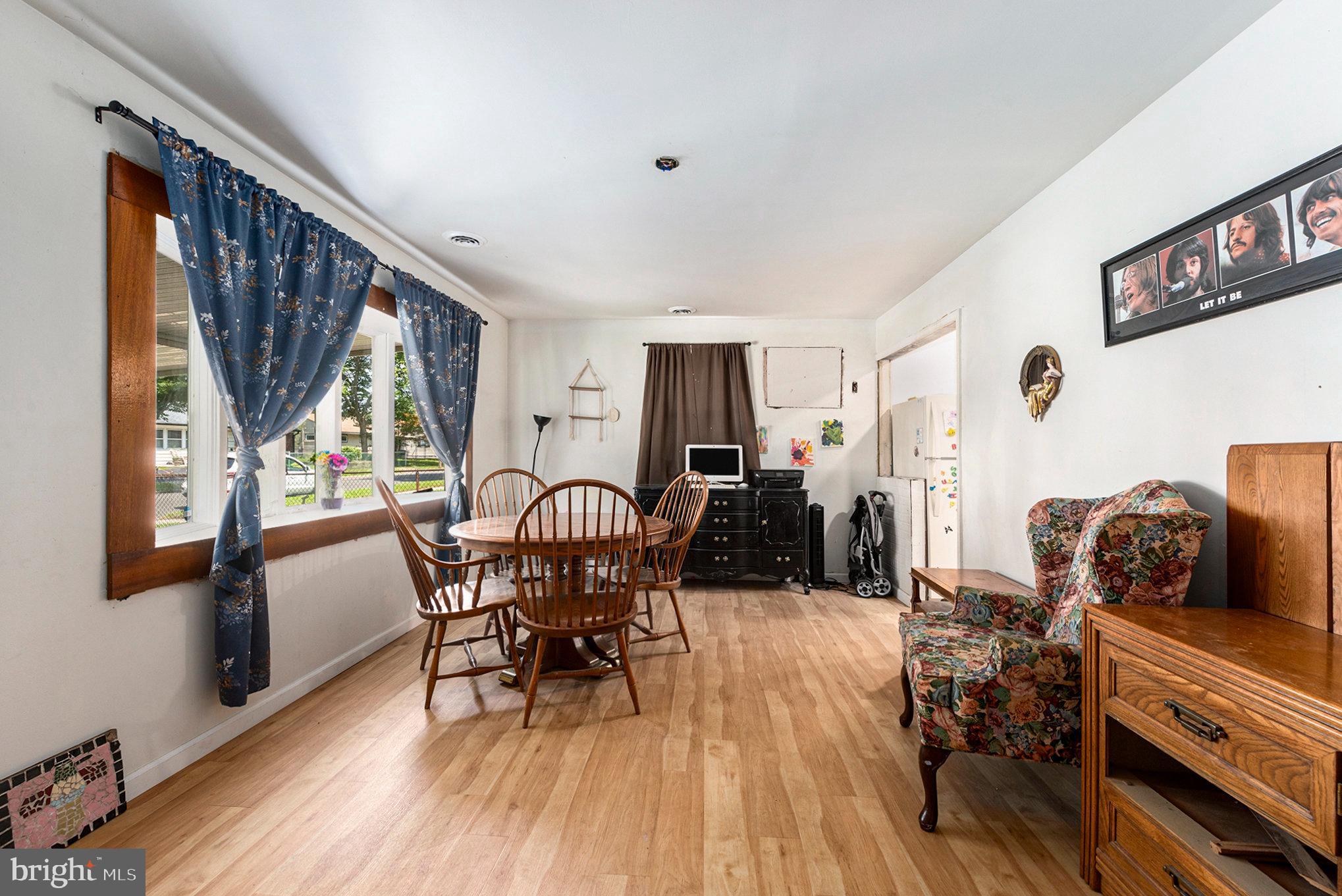 1306 Susan Avenue Croydon, PA 19021 - Photo 11 of 29 a dining room with furniture window and wooden floor
